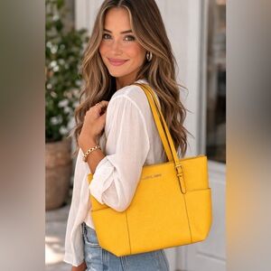 Michael Kors Yellow Leather Charlotte Saffiano Bag.